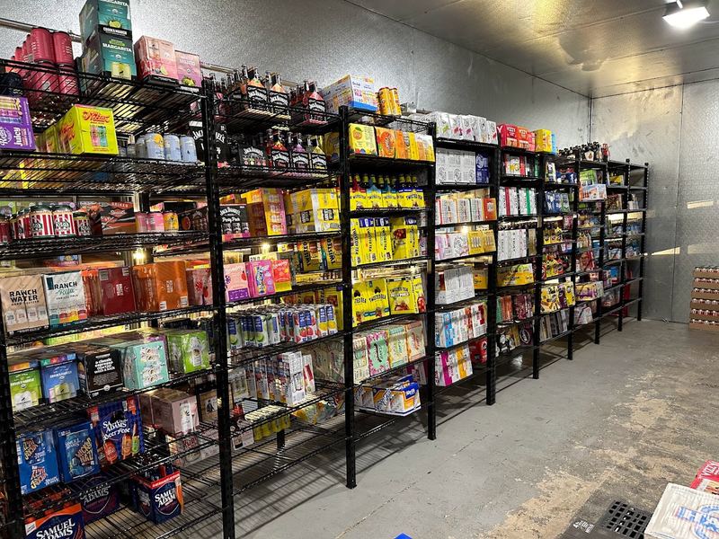 Cooler shelves of seltzers, ciders and flavored malt drinks at Rugers Beer in Levittown